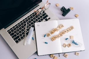 Blue Pills and Scrabble Tiles on a Planner