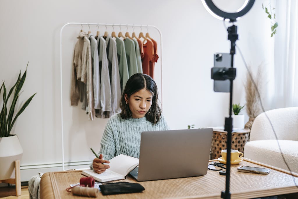 Focused blogger working on project at home