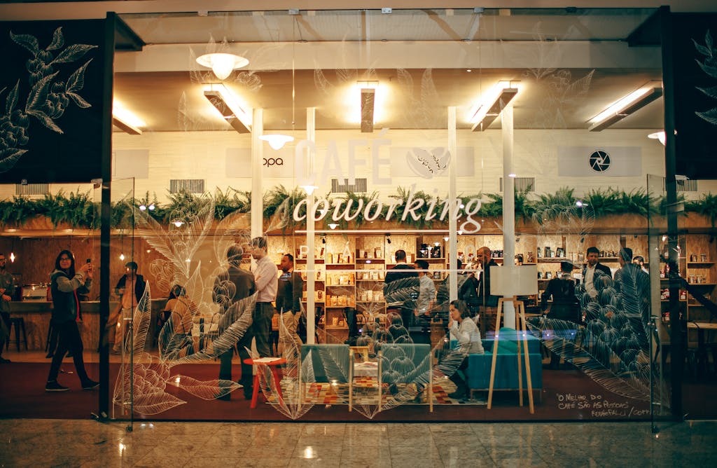 People Standing Inside Clear Glass Panel