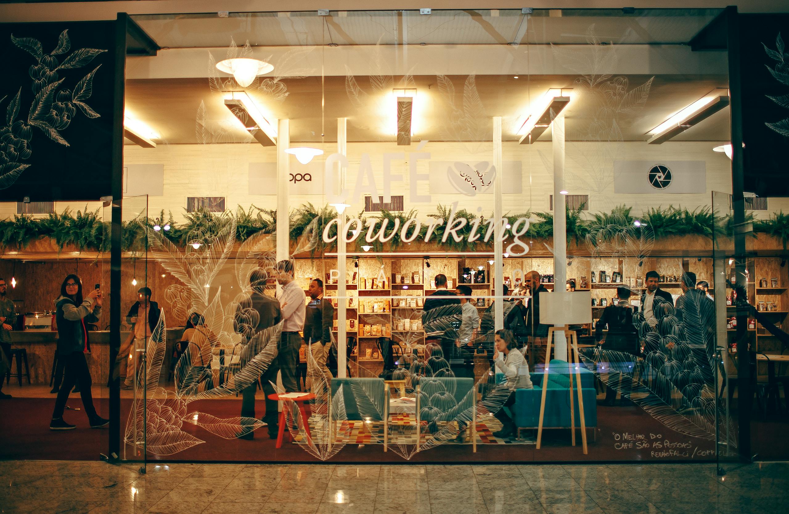 People Standing Inside Clear Glass Panel